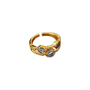 Bague vintage ajustable dorée et argentée avec motifs de pièces rondes en relief