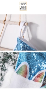 Detail of blue sequin unicorn Christmas stocking with white faux fur cuff and hanging loop