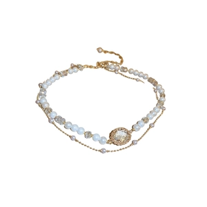 French vintage double-layered pearl and crystal necklace with a gold-set stone pendant