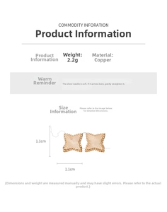 Detailed view of gold star stud earrings showing 1.1cm size and textured surface