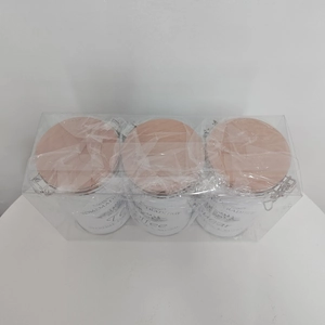 Close-up of 3 kitchen storage jars for tea, coffee, and sugar in clear display packaging