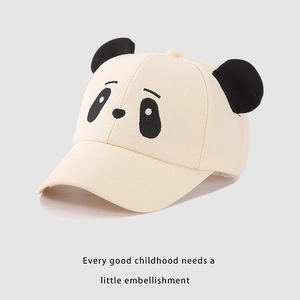 Detail of cute panda ears and embroidered facial features on kids' beige baseball cap