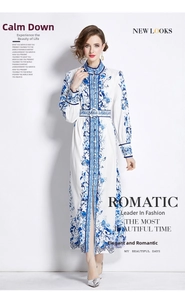 Detail of elegant porcelain blue floral dress with stand collar and matching waist belt
