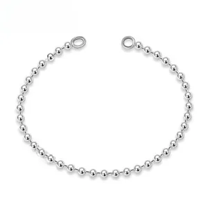 Macro detail of S925 sterling silver beaded chain with minimalist round ring connectors