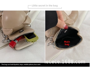 Internal view of the bear crossbody bag showing space for phone, lipstick and keys