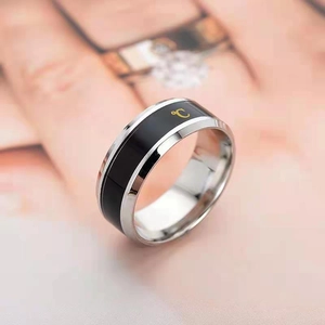 Smart titanium steel temperature ring with black inlay and golden Celsius degree symbol