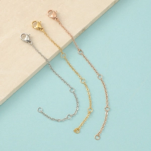 Adjustable stainless steel extension chains in silver, gold, and rose gold with lobster clasps