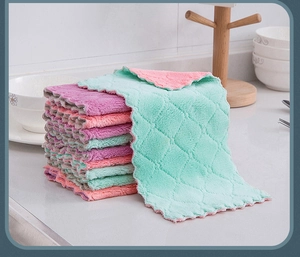 Thick microfiber cleaning cloths with diamond texture and elegant wavy edges in kitchen set