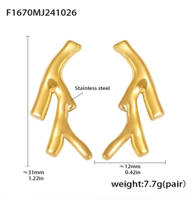 Detailed view of irregular tree branch earrings in polished gold stainless steel