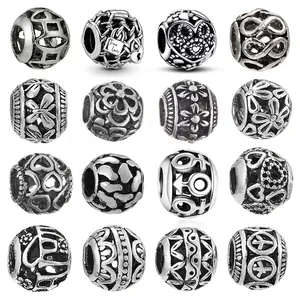 Assorted vintage silver hollow charms with heart and floral patterns for DIY bracelets