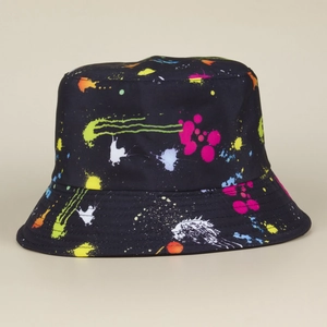 Close-up of a black bucket hat featuring vibrant multi-color splatter print and stitching