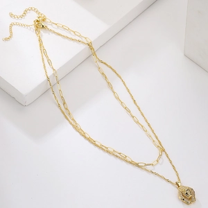 Gold-plated layered paperclip chain necklace featuring a zircon-encrusted leopard pendant