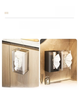 Macro detail of wall-mounted acrylic tissue box on marble bathroom countertop