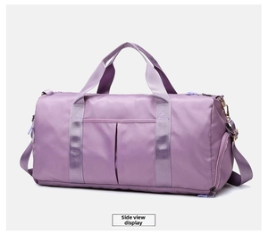 Side view of large purple fitness bag with water-resistant nylon and adjustable shoulder strap