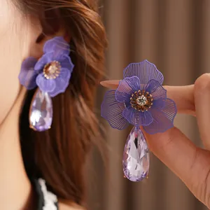 Elegant purple flower drop earrings set with hollow petals and zircon crystal accents