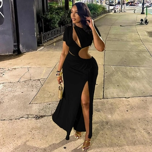 Detailed view of black slim fit dress featuring side cut-outs and a high slit design