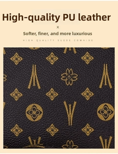 Detailed macro view of dark brown faux leather material with elegant gold floral pattern