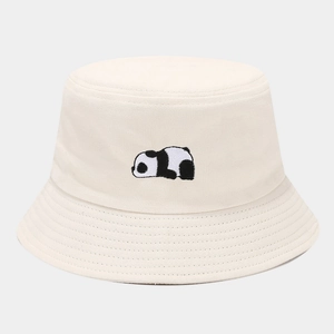 Close-up of cute panda embroidery on a cream cotton bucket hat with premium stitch detail