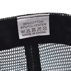 Detail of the internal wash label showing 20% cotton and 80% polyester mesh cap fabric