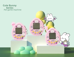 Pink egg-shaped virtual pet game machine with cute bunny design on geometric pedestals