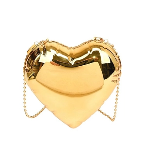 Metallic gold heart-shaped crossbody bag with balloon texture and sleek ball chain