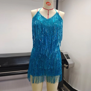 Detail of blue sequin fringe dress featuring shiny tassels for latin dance or party