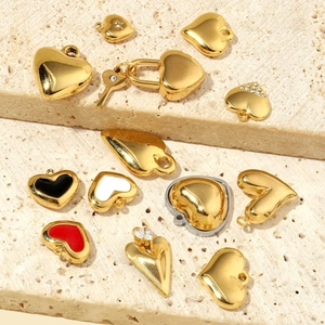 French vintage gold heart and key pendants with enamel and sparkling zircon details