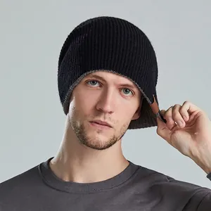 Winter knit beanie for men and women with reversible double-layer warm design in dark blue