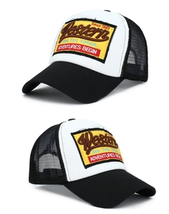 Close-up of Western vintage trucker hat with yellow embroidery patch and mesh backing