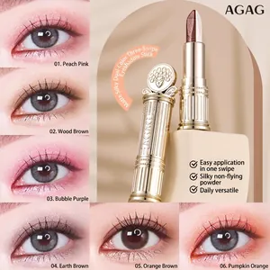 Dual-color shimmering eyeshadow stick with metallic relief case and six makeup swatches
