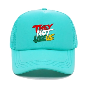 Turquoise trucker hat featuring 'THEY NOT LIKE US' graffiti text and breathable mesh back