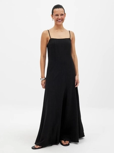Detail of black cotton long dress featuring a square neckline and sleek A-line silhouette