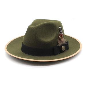 Classic dark olive wool fedora hat featuring black ribbon band and natural feather decor