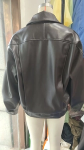 Back view of black faux leather jacket with loose fit silhouette and elasticated hemline