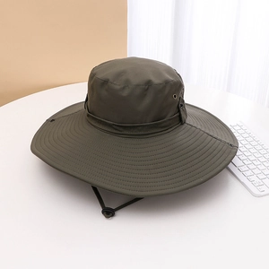 Detail of army green outdoor sun hat with wide brim, ventilation holes and chin strap