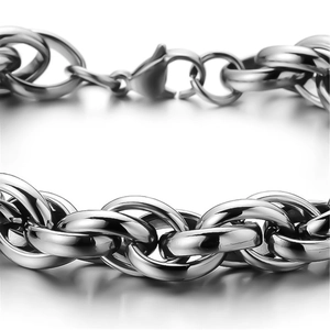 Detailed macro view of silver stainless steel interlocking chain link with lobster clasp