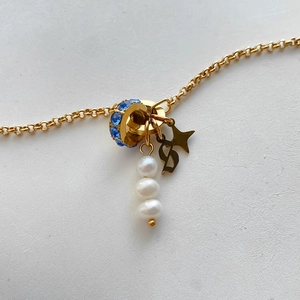 Titanium steel 14K gold plated necklace with blue rhinestone, star, pearl, and D charms