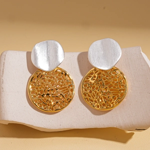 Detail view of 18k gold plated and matte silver contrast hollow geometric earrings