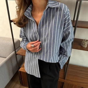 Women's classic blue and white vertical striped long sleeve button down shirt jacket