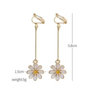 Detail view of daisy clip-on earrings with 5.8cm length and white enamel flower