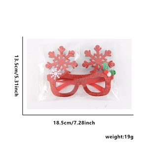 Close-up of red glitter Christmas snowflake glasses with size 18.5x13.5cm and holly details