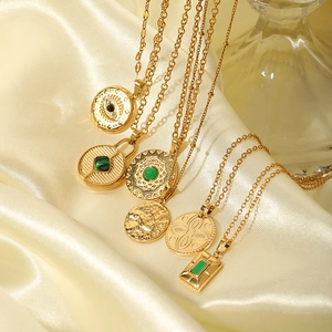 Multiple 18K gold-plated stainless steel necklaces with evil eye and round pendants
