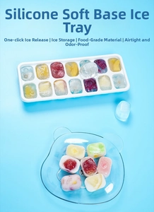 Detail of 14-grid silicone ice cube tray with fruit-filled cubes and soft bottom