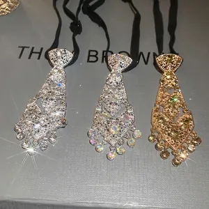 Luxurious rhinestone tie tassel necklaces in silver, aurora, and gold finishes