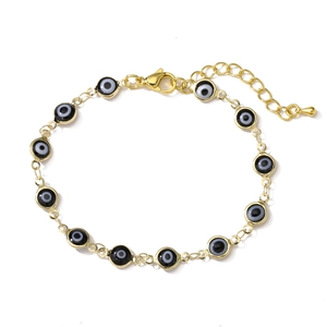 Adjustable gold evil eye bracelet with 11 black drip oil beads on a lobster clasp chain