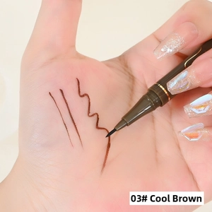 Detailed swatch of 0.05mm ultra-fine liquid eyeliner in 03 Cold Brown on skin