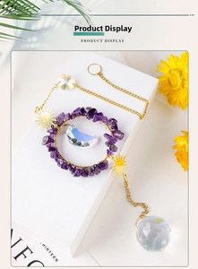 Detailed suncatcher view with purple crystals, golden moon, and faceted glass ball