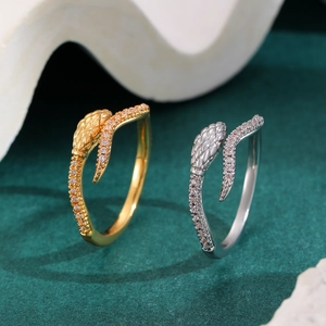 Elegante schlangenförmige offene Ringe in Gold und Silber mit funkelndem Zirkonia-Besatz