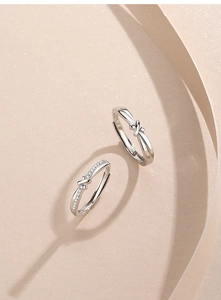 Macro detail of S925 sterling silver knotted ring set with shiny cubic zirconia accents