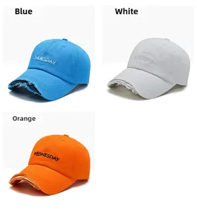 Detailed embroidery of weekdays on distressed baseball caps with frayed brim accents